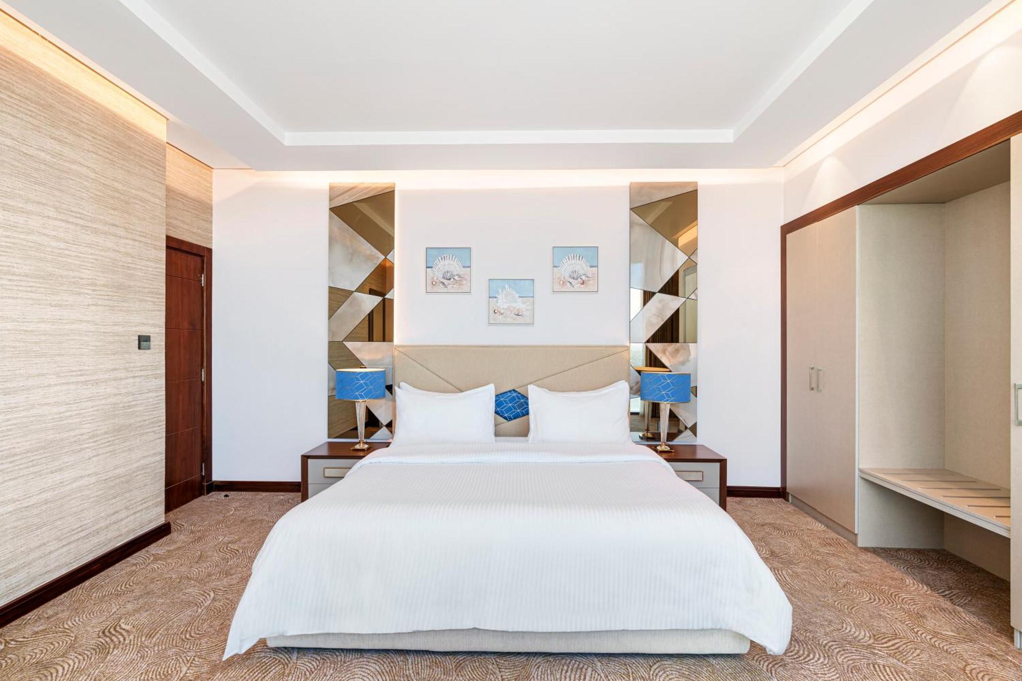Rixos Premium Alamein El Alamein Quarto foto A bedroom at the hotel
