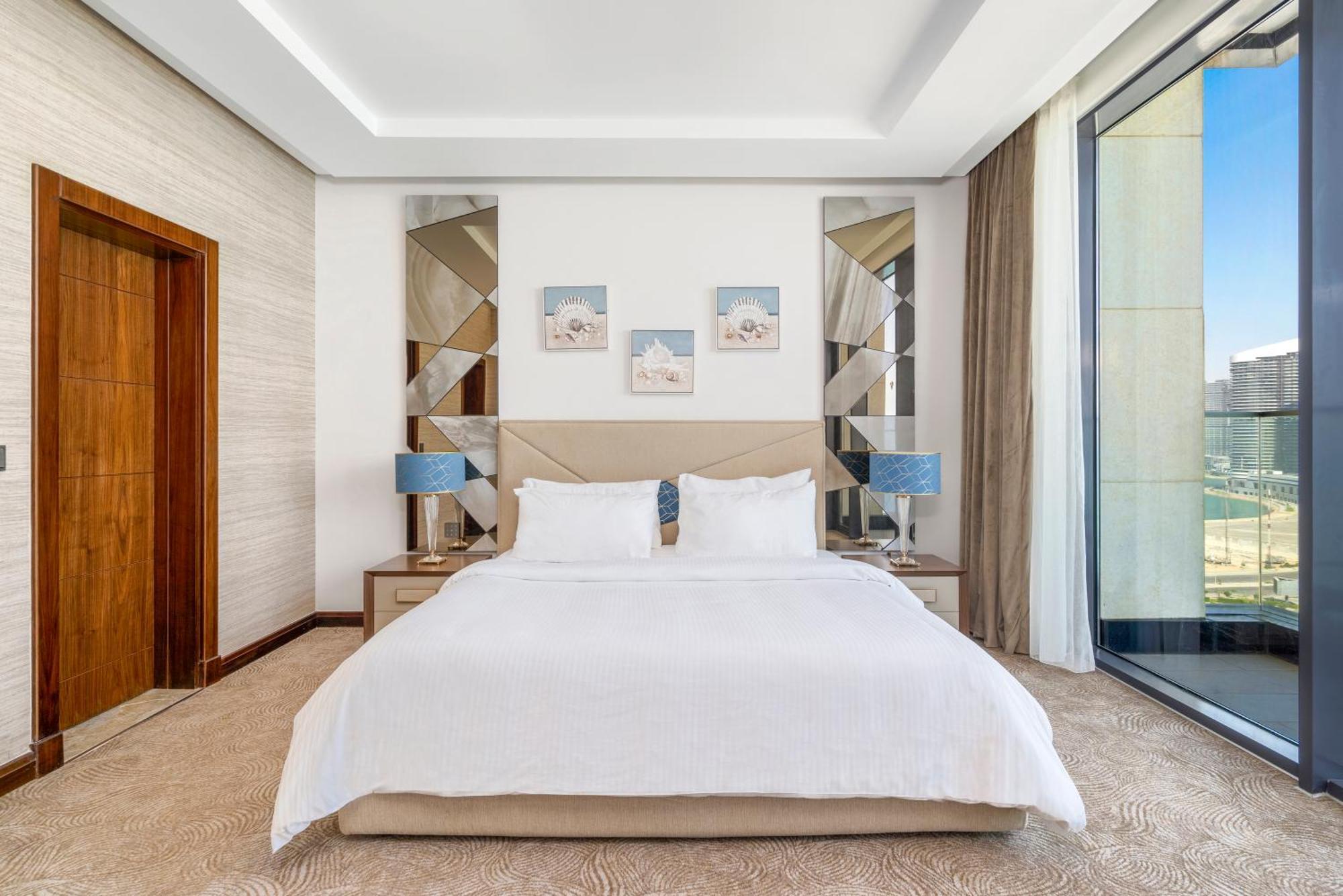 Rixos Premium Alamein El Alamein Quarto foto A bedroom at the hotel