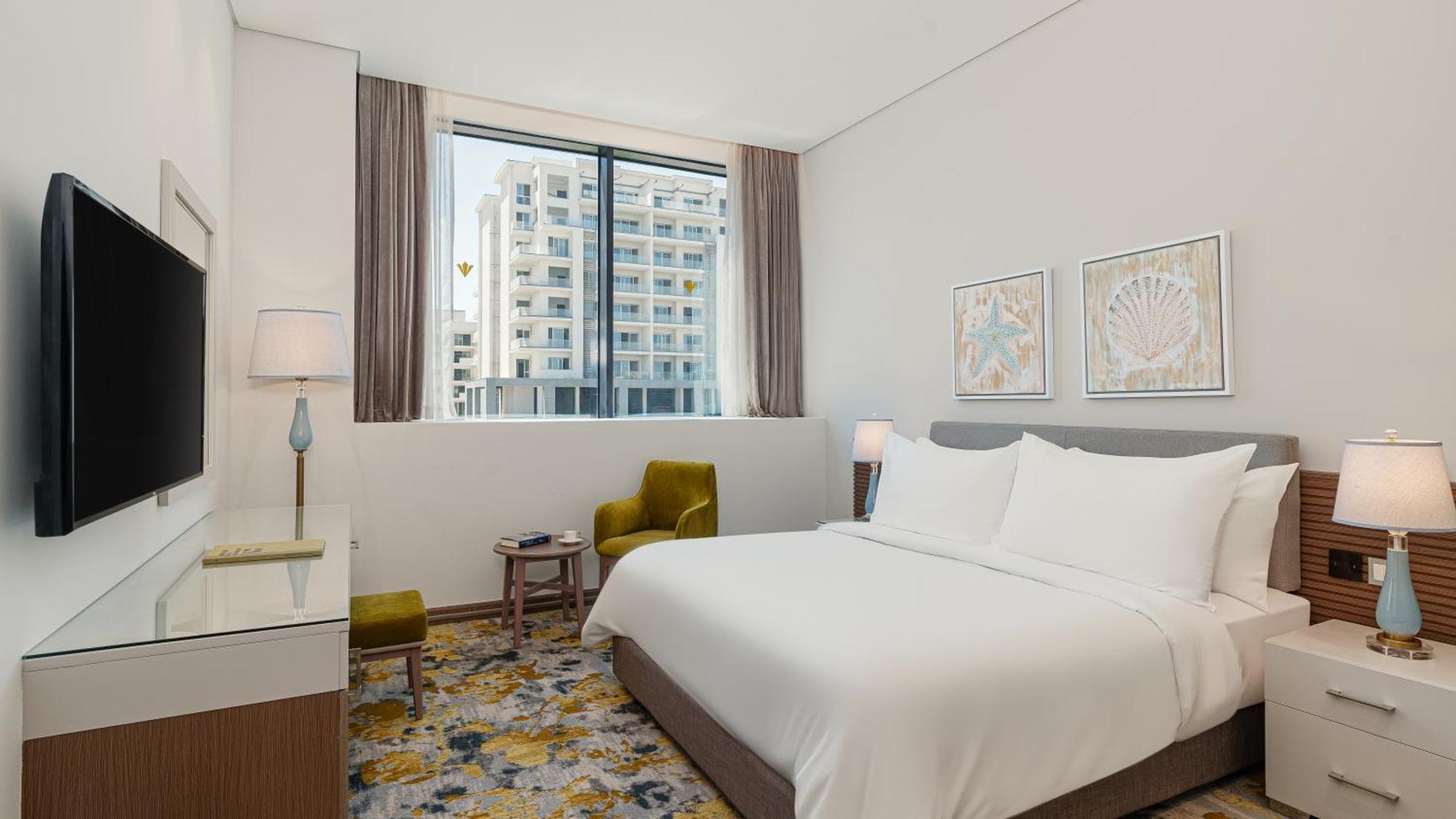Rixos Premium Alamein El Alamein Quarto foto A guest room at the hotel